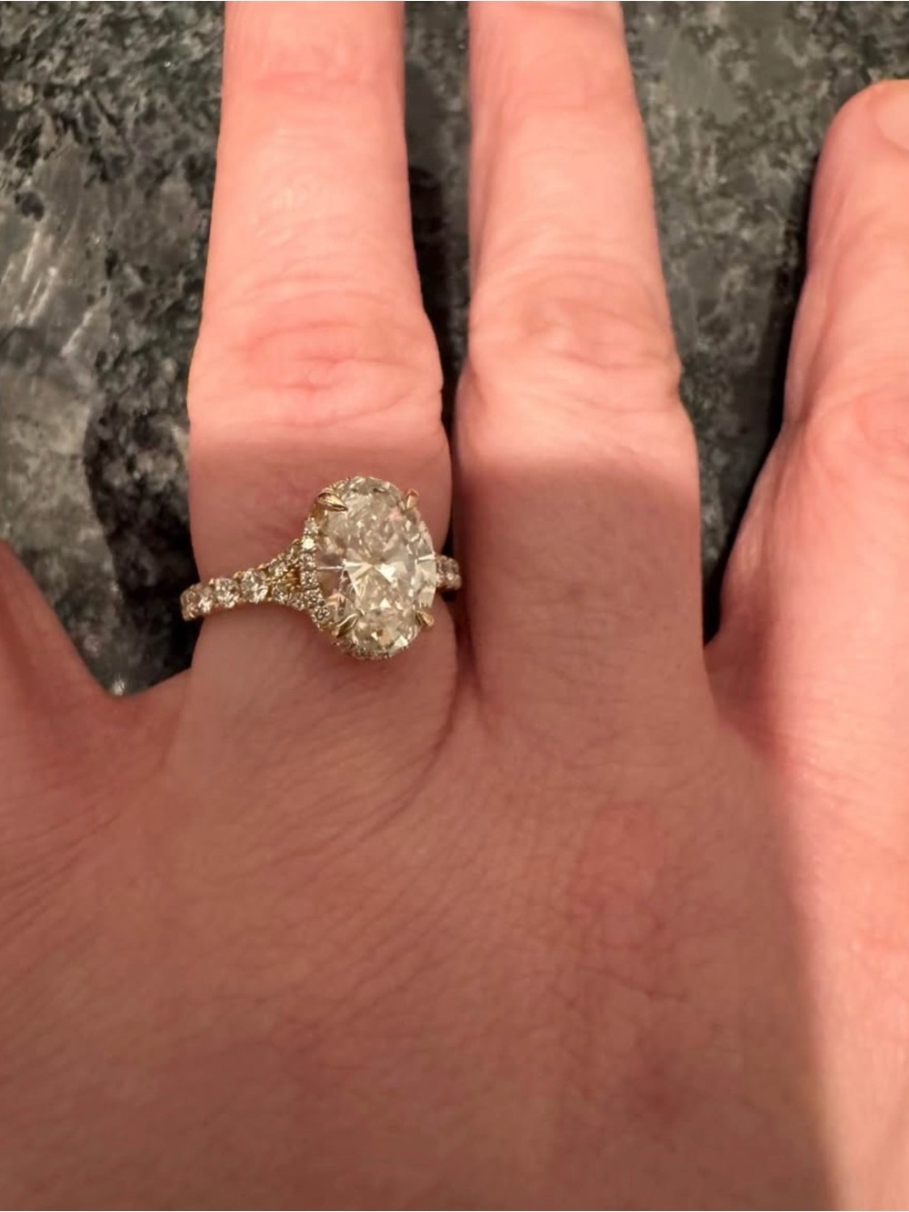 Zales Gold Oval Halo Ring with Clear Stones